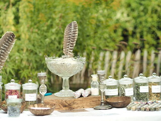 Dried herbs in glasses on a farmers market