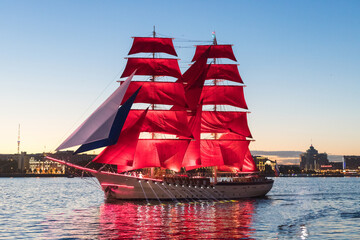 Saint-Petersburg. Holiday of Scarlet Sails. Russia. A sailboat sails on the Neva. Annual alumni...