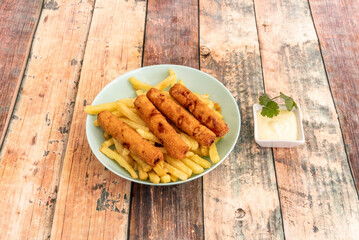 They are prepared by covering the chicken meat with a mixture of breading and frying. Traditionally, chicken strips are mainly white meat, made with meat cut from the breast