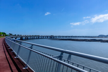 Naklejka premium pedestrian bridge over the ocean