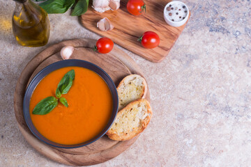 Tomato soup with basil.  Healthy, vegan and dieting lunch and dinner concept. Gazpacho. 