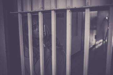 Hands of women desperate to catch the iron prison,prisoner concept,thailand people,Hope to be...