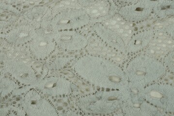 gray white texture of woolen fabric with a pattern