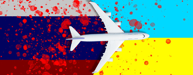Russian flag, toy plane and barbed wire on background, concept of banning aircraft departing from Russia