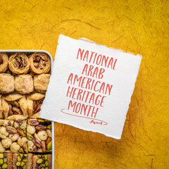 April - National Arab American Heritage Month, reminder note with a tin box of traditional Turkish baklava pastry