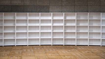 White bookcase with empty shelves