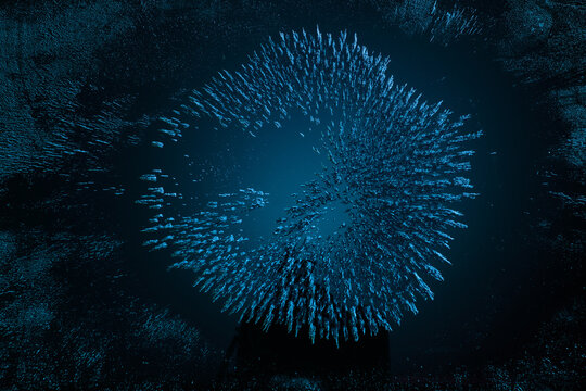 Magnetfeld-Visualisierung als abstrakter Hintergrund, Struktur aus magnetischem Eisenstaub auf t&uuml;rkis-farbenem Hintergrund