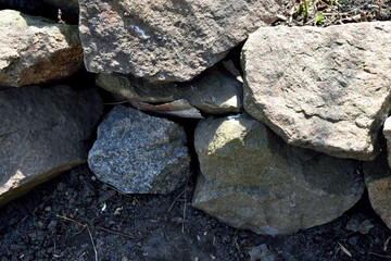 stacked gray stones, close-up as texture for background