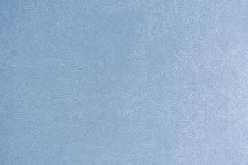 detalle de textura de cubierta de portada de agenda polipiel azul con detalles de impresión dorada - obrazy, fototapety, plakaty