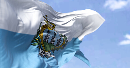 Detail of the national flag of San Marino waving in the wind on a clear da