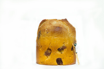 Miniature painter with an Italian Christmas biscuit called panettone isolated on white background.