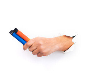 Two Disposable electronic cigarettes in hand closeup on a white background with shadows. The...
