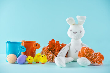 Spring Easter bright background with flowers, eggs and toys