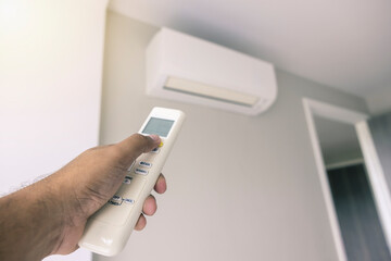 Control the air conditioner using the bedroom remote control on hot days