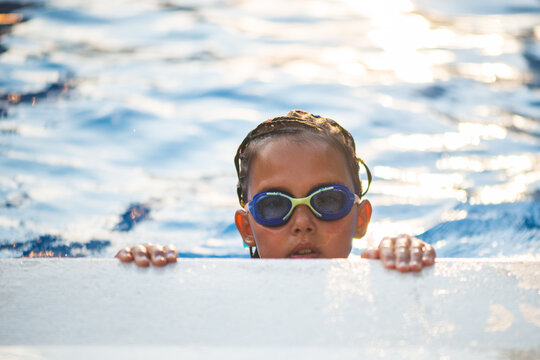 Portrait of a little swimer at the pool
