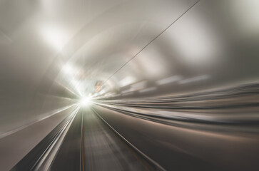 Speed blur boundaries in the tunnel tube light metal gloss.
