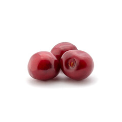 Photo of red cherries isolated on white background