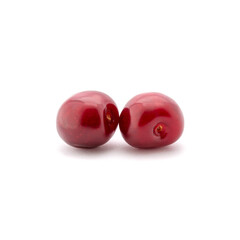 Photo of red cherries isolated on white background