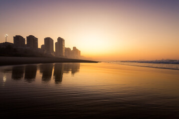 Fototapeta premium Barra da Tijuca Beach on Sunrise With Apartment Buildings in Front of the Ocean in Rio de Janeiro, Brazil