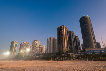 Barra da Tijuca Beach with Luxury Condominium Apartment and Hotel Buildings on Sunrise in Rio de Janeiro, Brazil