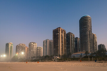 Fototapeta na wymiar Barra da Tijuca Beach with Luxury Condominium Apartment and Hotel Buildings on Sunrise in Rio de Janeiro, Brazil