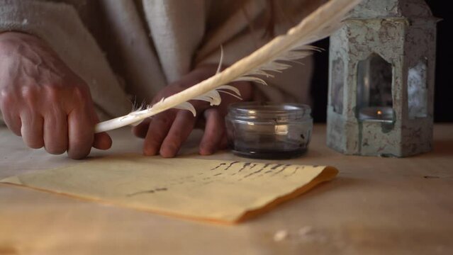 Finished writing letter with feather quill 