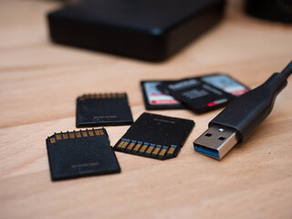 SD Cards, memory cards and external disk on desk