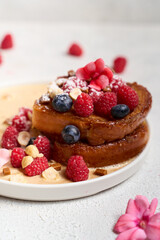 Ring rum baba with lime and basil and raspberries