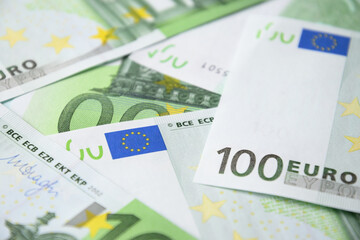 European money in banknotes of 100 euros. Euro currency banknotes background. Close up.