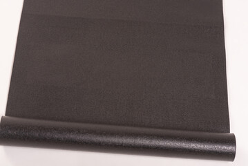 Black Yoga Mat isolated with White Background