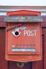 Old analogue mailbox has been given new life as a bird box