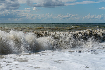 sea waves splashing on a hot summer  beach