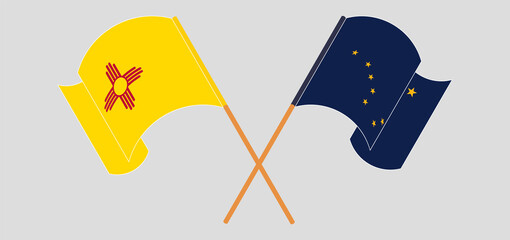 Crossed flags of the State of New Mexico and the State of Alaska. Official colors. Correct proportion