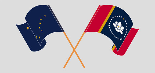 Crossed flags of the State of Alaska and The State of Mississippi. Official colors. Correct proportion