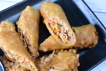 Japanese food, lumpias, with vegetables, seafood, fresh mussels and sauce