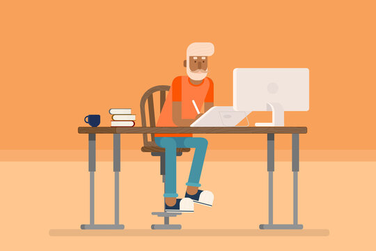 hipster man working at the table on the computer