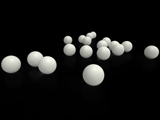 White balls on black background