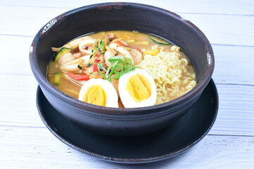 Japanese ramen, miro-based soup, sirloin steak, vegetables, pasta, and egg