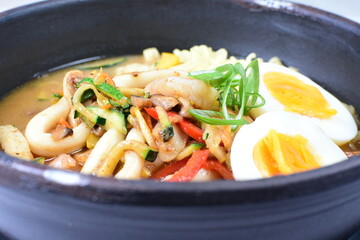 Japanese ramen, miro-based soup, sirloin steak, vegetables, pasta, and egg
