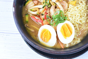 Japanese ramen, miro-based soup, sirloin steak, vegetables, pasta, and egg