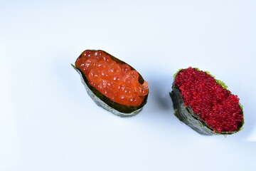 traditional japanese food, very colorful on white plate and sauce