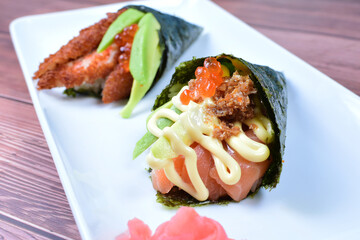 traditional japanese food, very colorful on white plate and sauce