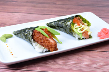 traditional japanese food, very colorful on white plate and sauce