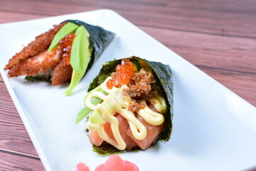 traditional japanese food, very colorful on white plate and sauce