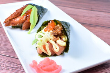 traditional japanese food, very colorful on white plate and sauce