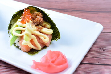 traditional japanese food, very colorful on white plate and sauce