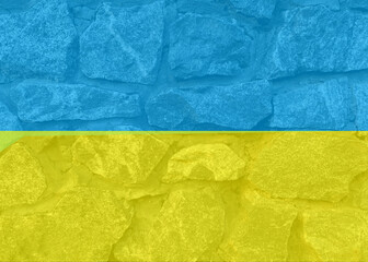 wall of large stones in yellow and blue colors, full screen image