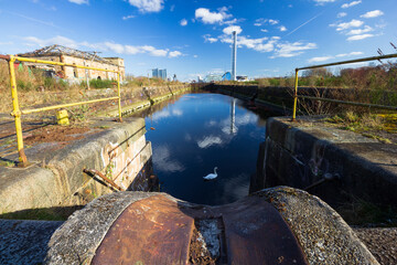 The post industrial, old ship building docks on the river Clyde on a clear spring morning 