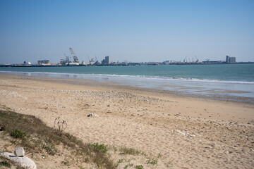 View of La Pallice, the trade port of La Rochelle. freight ships and cranes in the trade port