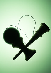 Kendama is a traditional Japanese skill toy. It consists of a handle (ken), a pair of cups (sarado), and a ball (tama) that are all connected together by a string